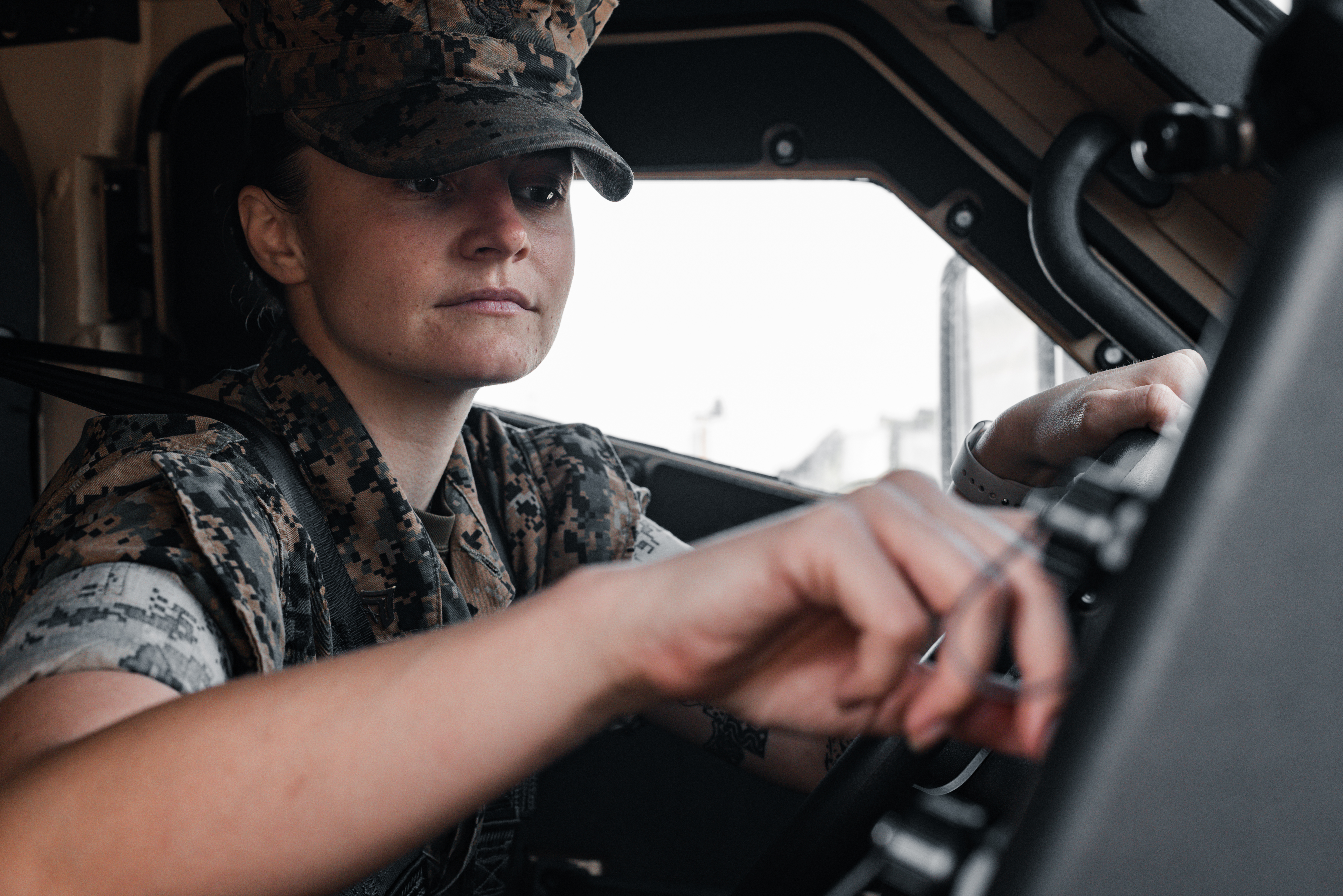 U.S. Marine Corps Cpl. Dilyn O’Connell, a motor transport operator assigned to Headquarters Battalion, 3d Marine Division, prepares a Joint Light-Weight Tactical Vehicle for a trip at Camp Courtney, Okinawa, Japan, April 3, 2023. O’Connell was identified as an exemplary Marine with a warfighting spirit and exceptional leadership ability when she was named class leader of HQBN Corporal’s Course 3-23. O’Connell shared her philosophy on small unit leadership saying, “A good leader doesn’t worry about their success, but about the success of those around and below them.” O’Connell, a native of Lapeer, Michigan, takes pride in her Marines’ success and is driven to support them to achieve their potential.
