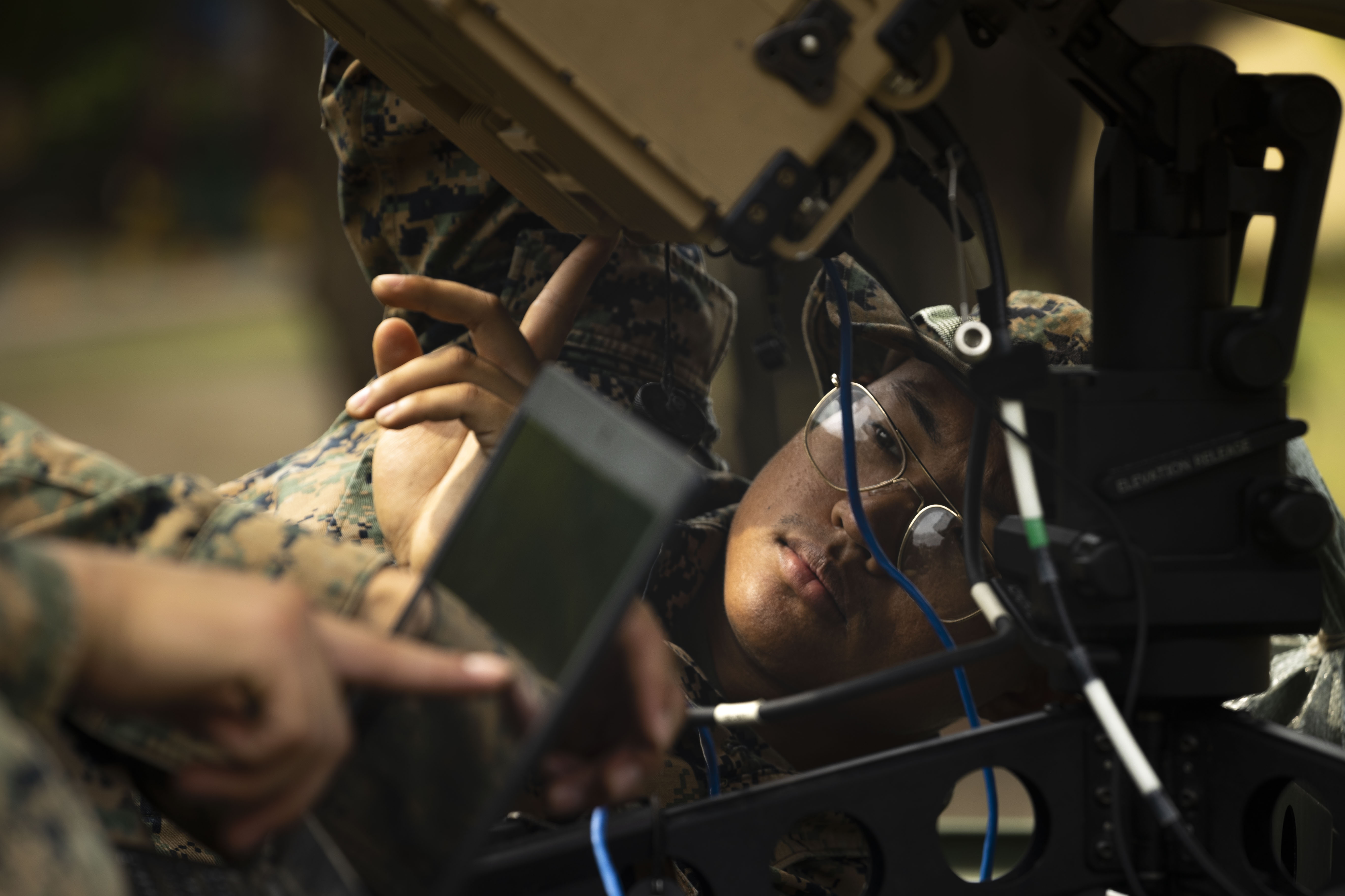 U.S. Marine Corps Cpl. Kawtamwe Htoo, a satellite communications operator with Headquarters Battalion, 3d Marine Division, establishes satellite communications during Balikatan 23 at Marine Base Gregorio Lim, Philippines, April 11, 2023. Balikatan 2023 is the 38th iteration of the annual bilateral exercise between the Armed Forces of the Philippines and the U.S. military. The exercise includes three weeks of training focused on amphibious operations, command and control, humanitarian assistance, urban operations and counterterrorism skills throughout northern and western Luzon. Coastal defense training figures prominently in the Balikatan 23 training schedule. Htoo, a native of Sherman, Texas, shared his philosophy on small unit leadership saying, “Keep your Marines informed and supervise. Allow your Marines to take on the task in their way. Help them if they need it, that’s how you build a leader.”